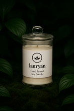 Load image into Gallery viewer, Lauryan hand poured soy candle in a glass jar with a dark background