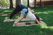 Load image into Gallery viewer, Lauryan family yoga mat set — parent and child on cork yoga mats outdoors